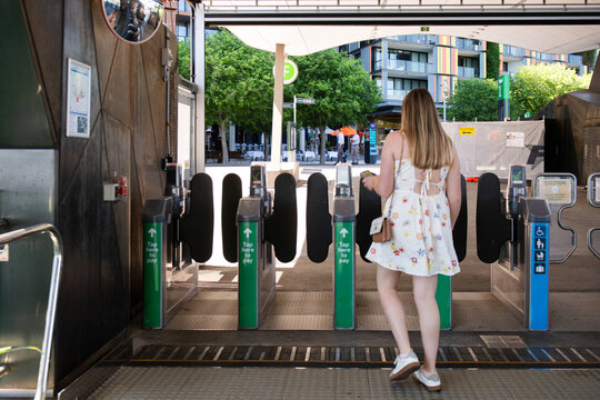 woman tapping off at ferry terminal in Sydney