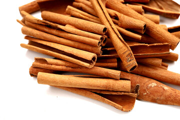 Dried cinnamon sticks arranged in a bundle.