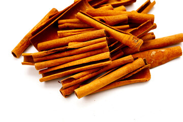 Dried cinnamon sticks arranged in a bundle.