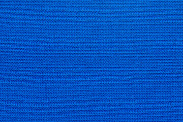 Fototapeta premium Cotton texture pattern closeup. Macro shot blue cotton texture background. Knitting pattern of cotton. Texture of fabric
