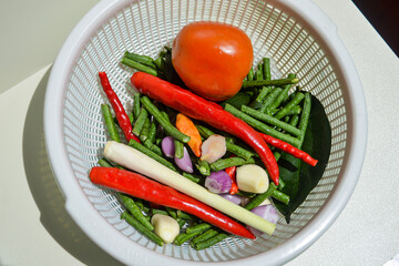 Home cooking: cooking ingredients, colorful vegetables, ready to cook