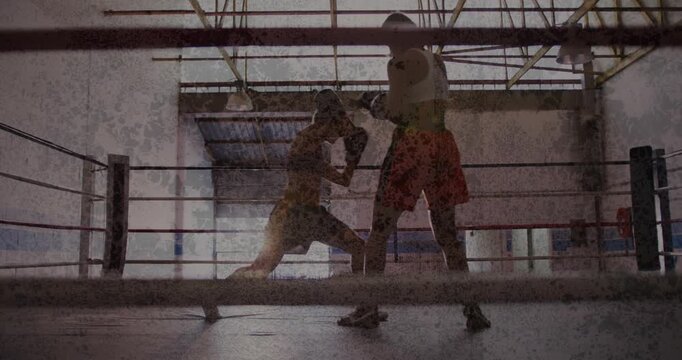 Two women boxers training in ring trading jabs shorter stepping inside landing body combo clinching