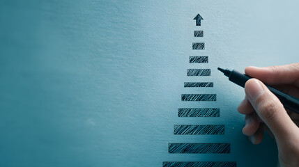 Hand drawing upward steps with arrow on blue background, symbolizing personal growth, career development, progress and goal achievement