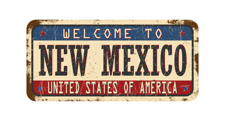 Welcome to New Mexico. An old worn sign with an inscription. Welcome metal plaque with rust elements