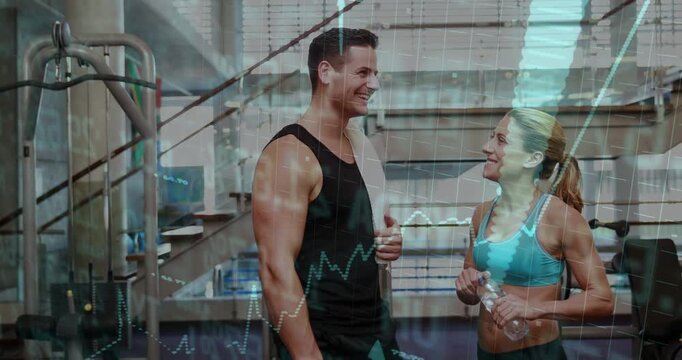 Trainer gesturing and trainee nodding, sharing gym tips while translucent chart sweeping over scene