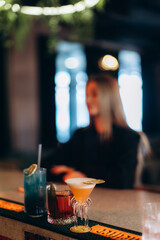 Close-Up of Assorted Cocktails at a Relaxed Bar Setting