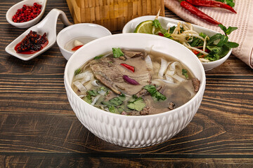 Vietnamese Pho Bo soup with beef and noodles