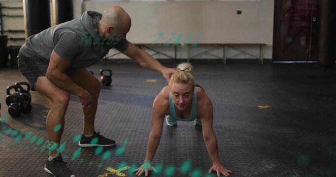 Female client pushing up after trainer tactile cue, improving fitness form with teal dotted overlay