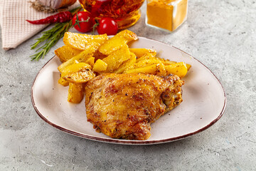 Baked chicken thighs with potatoes