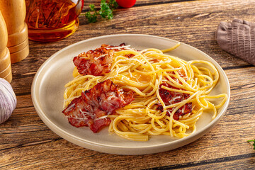 Italian classic spaghetti carbonara with bacon and egg