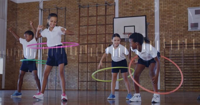 Students reacting to sound cue and spinning hula hoops in school gym leader guiding overlay syncing