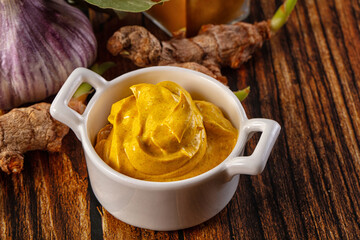 Indian yellow spicy curry sauce