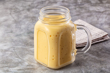 Sweet mango smoothie dessert glass