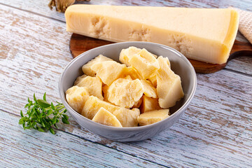 Parmesan cheese pieces in the bowl