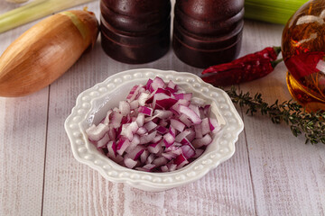 Diced red onion in the bowl