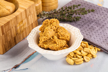 Crunchy peanut butter fat product
