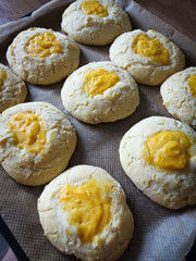 Freshly baked thumbprint cookies with sweet custard filling