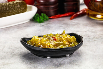 Souce gherkin relish with marinated cucumbers