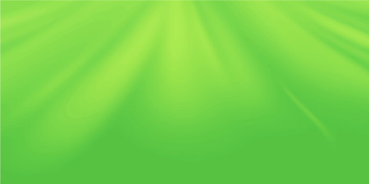 Abstract green background with soft light rays and smooth blurred motion waves creates a nature-inspired gradient texture for a modern wallpaper design
