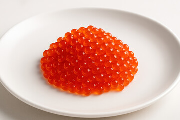 Vibrant Hill of Salmon Roe on a Pristine White Plate