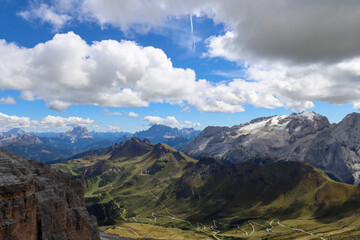 Aerial Dolomites view from Rifugio Maria, with Marmolada glacier rising behind Passo Pordoi valley