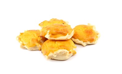 Homemade Pardulas, also called Formaggelle, on white background. It is a typical Sardinian small cake made with ricotta or cheese.