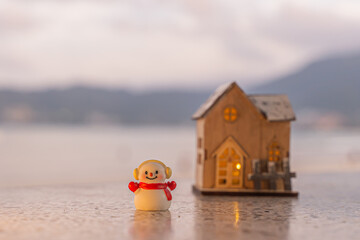 Merry Christmas word in wooden on the beach of tidewater green tone background, wide banner, Christmas banner, happy concept, copy space, soft focus Sky in the morning, Patong Beach, Phuket Thailand
