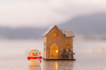 Merry Christmas word in wooden on the beach of tidewater green tone background, wide banner, Christmas banner, happy concept, copy space, soft focus Sky in the morning, Patong Beach, Phuket Thailand