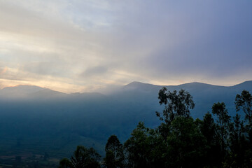 Sun rises above the horizon. A stunning sunrise paints the sky with soft hues, Nature landscape.