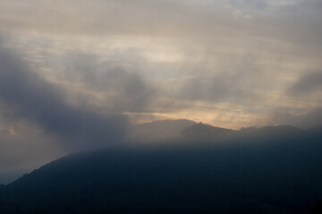 Sun rises above the horizon. A stunning sunrise paints the sky with soft hues, Nature landscape.