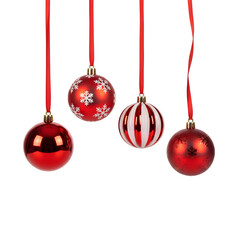 Four Red Christmas Ornaments Hanging by Ribbons Isolated on White Background, Featuring Glossy, Snowflake, and Striped Designs for Festive Holiday Decoration
