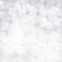 Soft white bokeh background with blurred light circles creating a gentle, elegant, and dreamy texture. Perfect for holiday designs, greeting cards, winter themes, and decorative graphic projects.