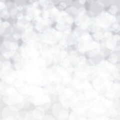 Soft white bokeh background with blurred light circles creating a gentle, elegant, and dreamy texture. Perfect for holiday designs, greeting cards, winter themes, and decorative graphic projects.