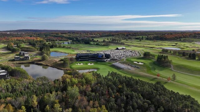 Aerial view of TPC Toronto at Osprey Valley, showcasing championship fairways, lakes, autumn colours, and the clubhouse complex set within Caledon&rsquo;s expansive golf landscape.