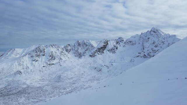 Mountain top, snow-capped peak, rocks, panorama of Kasprowy Wierch, Poland.