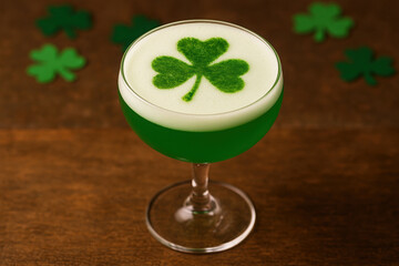 Festive green cocktail with shamrock garnish celebrating st patricks day