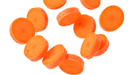 Fresh carrot slices falling with dynamic motion on black background, healthy food concept