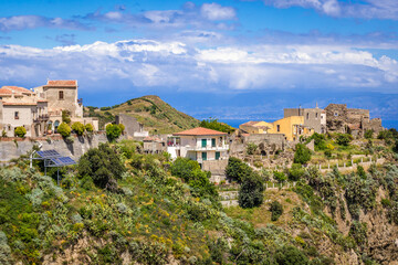 Fototapeta premium Houses on a hill in Savoca, small town on Sicily in Italy