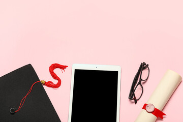 Mortar board with diploma, eyeglasses and modern tablet computer on pink background