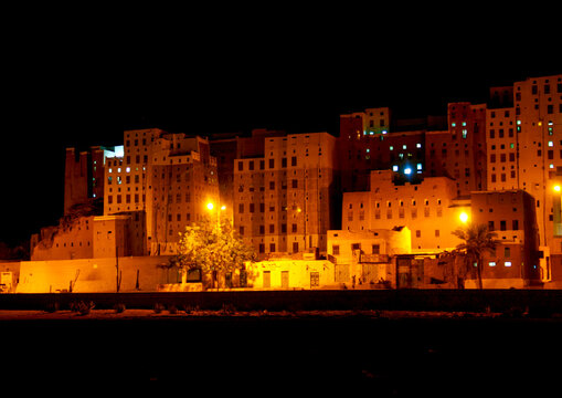 Multi- storey buildings made from mud at night, Hadhramaut, Shibam, Yemen