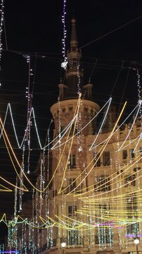 Madrid, Spain - December 30, 2025: , Festive Christmas lights illuminating Madrid city street at night