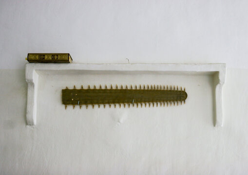 Quran and rostrum on a wall, Amanat Al-Asemah, Sanaa, Yemen