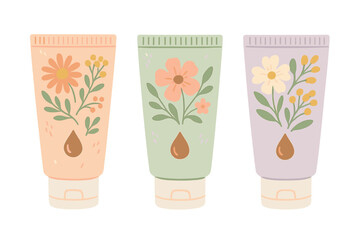 Fototapeta premium Three pastel cosmetic tubes with organic floral patterns and essential oil drops