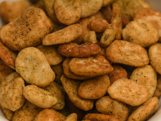 Bowl of Koro beans or jack beans on white background