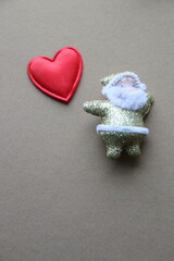 Santa Claus with a heart. Christmas card.