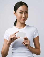 Beautiful Asian Woman Holding Blank Business Card Mockup