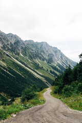 Panoramic View of High Mountains During a Summer Hike, Sunny Alpine Landscape and Outdoor Adventure Concept