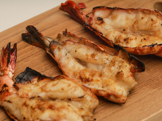 Grilled shrimp on wooden tray