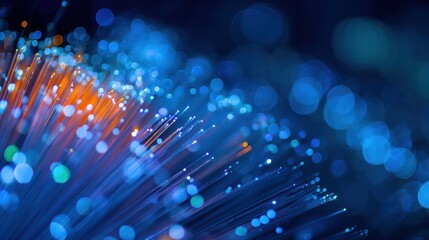 Illuminated Fibers: Captivating close-up of illuminated optic fibers, the image evokes a sense of modern technology and data transmission, revealing a beautiful display of light.