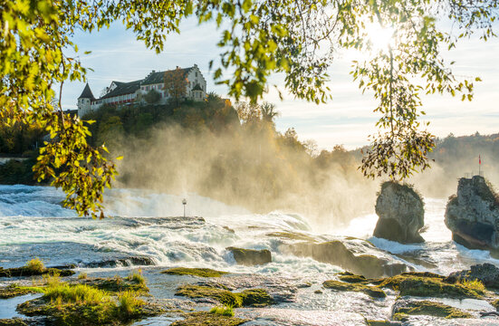 Autumn landscape of Rhine Falls and Schloss Laufen. Switzerland.